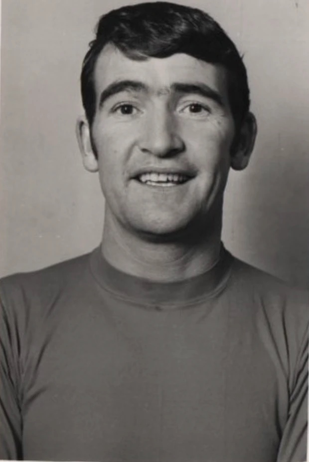 Portrait of Barry Murphy in a Barnsley shirt, smiling